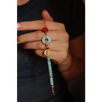 Jade kralen en rode agaat goodluck armband