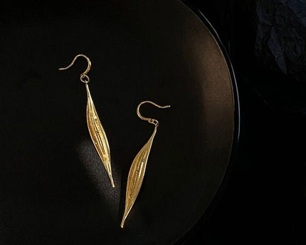 Subtiele oogverblindende gouden blad oorbellen
