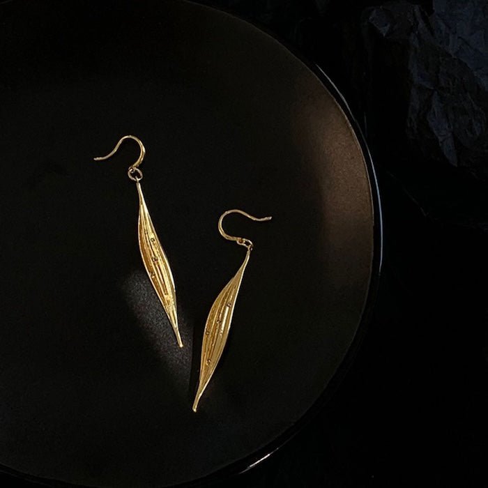 Subtiele oogverblindende gouden blad oorbellen