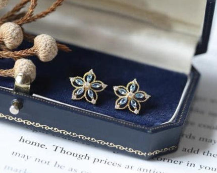 Bauhinia-Sky Blue Topaz Flower Ear studs