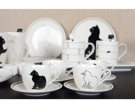 Koffiekopjes met zwart -witte kattenschotels - veel van 4