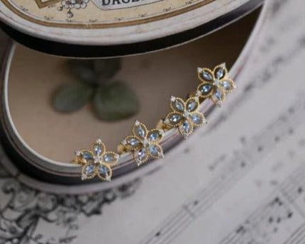Bauhinia-Sky Blue Topaz Flower Ear studs