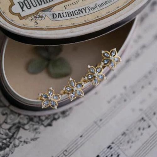 Bauhinia-Sky Blue Topaz Flower Ear studs