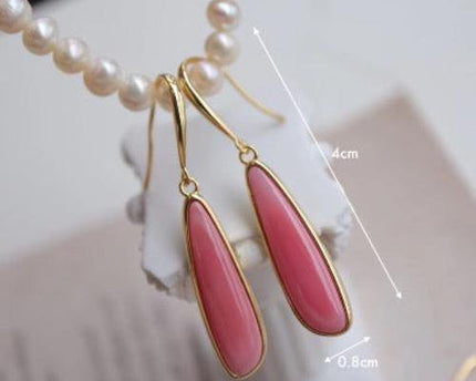 Minimalistische roze koningin Conch Shell oorbellen