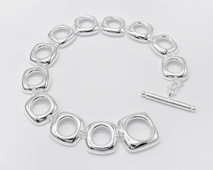 Stevige sterlingzilveren armband met gedurfde look en vierkante frameschakels met OT-gesp