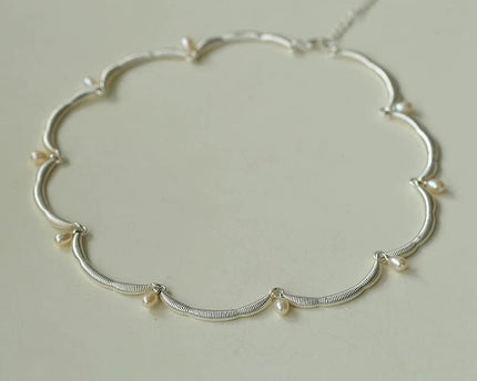 Elegante kanten bloemversiering parelketting