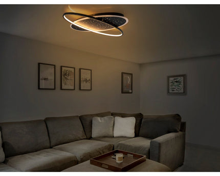 LED -plafondlamp "Stelaris" ongeveer 60 cm lang, gemaakt van metaal en plastic in het zwart, met stevig gebouwde LED's, verlichting voor woonkamers en kantoor