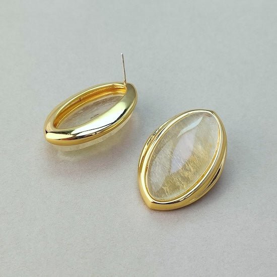 Gedurfde minimalistische gouden rutielkwarts oorbellen