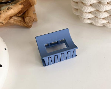 Minimalistische blauwe kleurtoon klauw haarclips