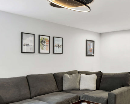 LED -plafondlamp "Stelaris" ongeveer 60 cm lang, gemaakt van metaal en plastic in het zwart, met stevig gebouwde LED's, verlichting voor woonkamers en kantoor