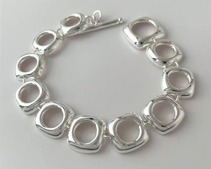 Stevige sterlingzilveren armband met gedurfde look en vierkante frameschakels met OT-gesp
