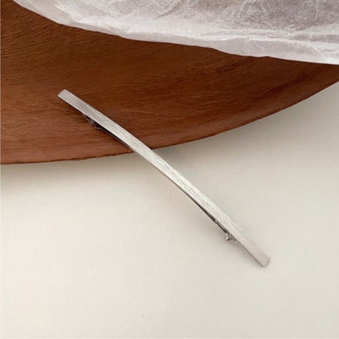 Minimalistische metalen haarclip met één regel