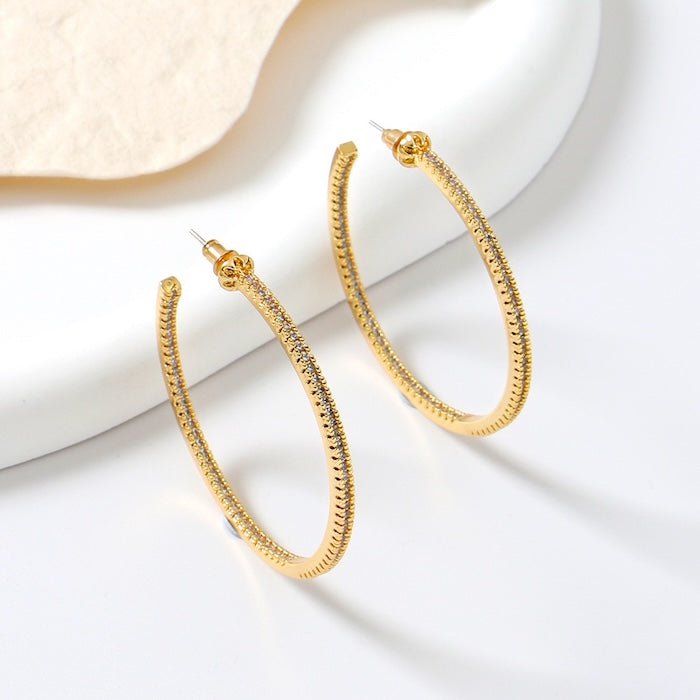 Oversized sprankelende hoepeloorbellen - 360 graden glamour