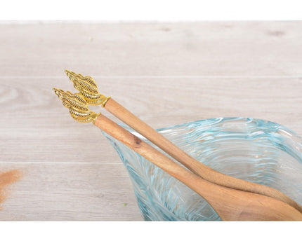 Gouden schaal salade bestek