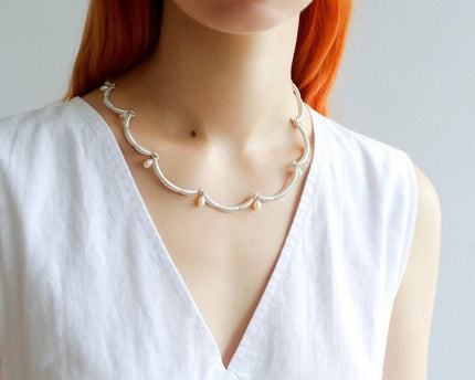 Elegante kanten bloemversiering parelketting