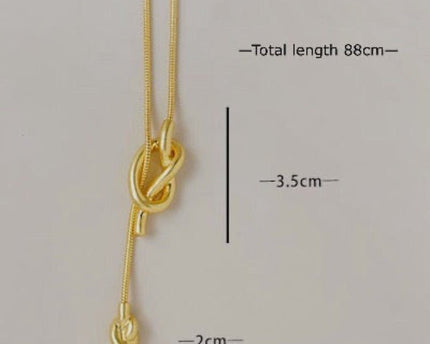 Minimalistische lange trui ketting met knoop
