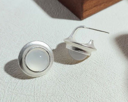 Chique matzilveren ronde oorsteker - Zwart en Wit Onyx