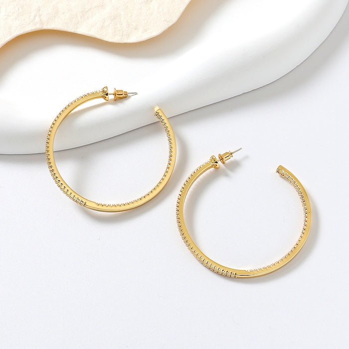 Oversized sprankelende hoepeloorbellen - 360 graden glamour