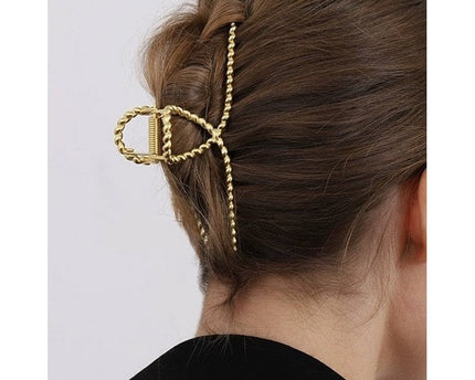 Minimalistische gedraaide lijn grote klauw haarclip
