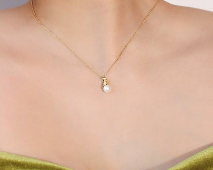 Leuke asymmetrische kattenoorbellen en ketting