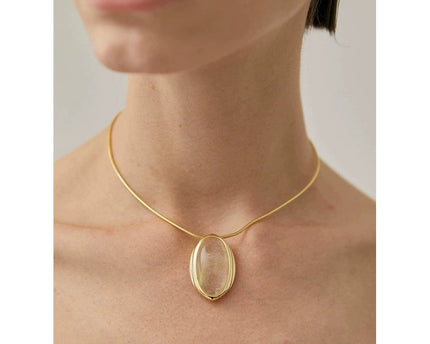 Minimalistisch goud gerutileerde kwarts ovale hanger ketting