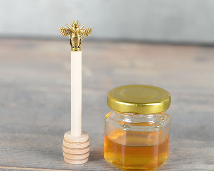 Gouden honinglepel bijen