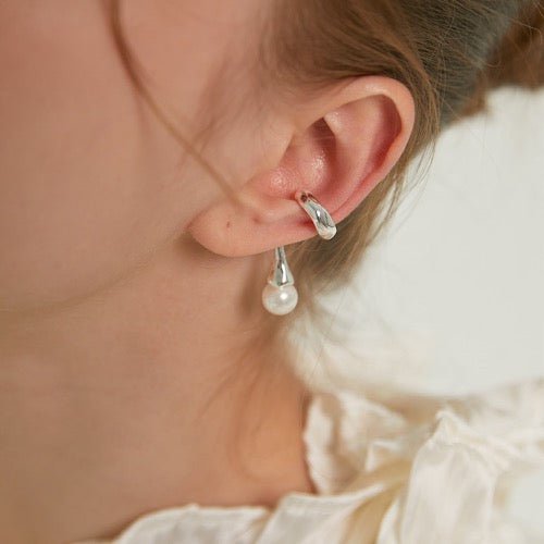 Oormanchetten met geometrische lijn en parel - Uit één stuk