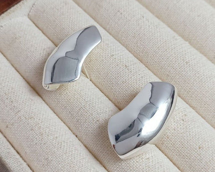 Unieke zilveren Armor Wrap oorbellen
