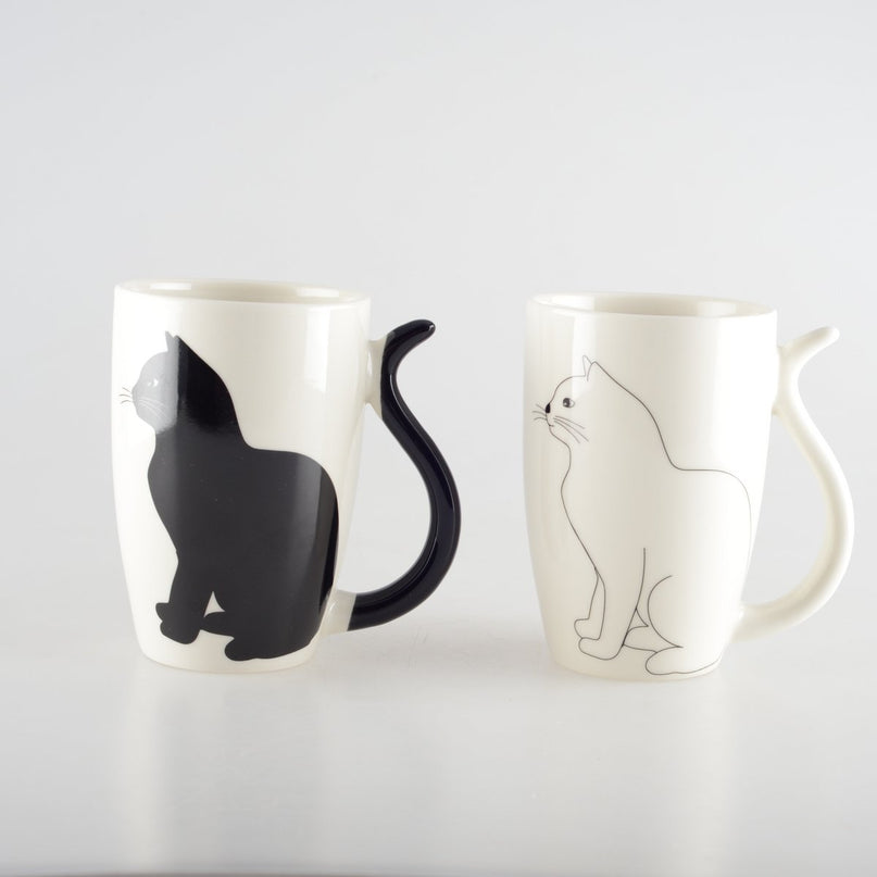 ZWART-WITTE KATTENBEKER MET STAARTVORMIG HANDVAT - SET VAN 2