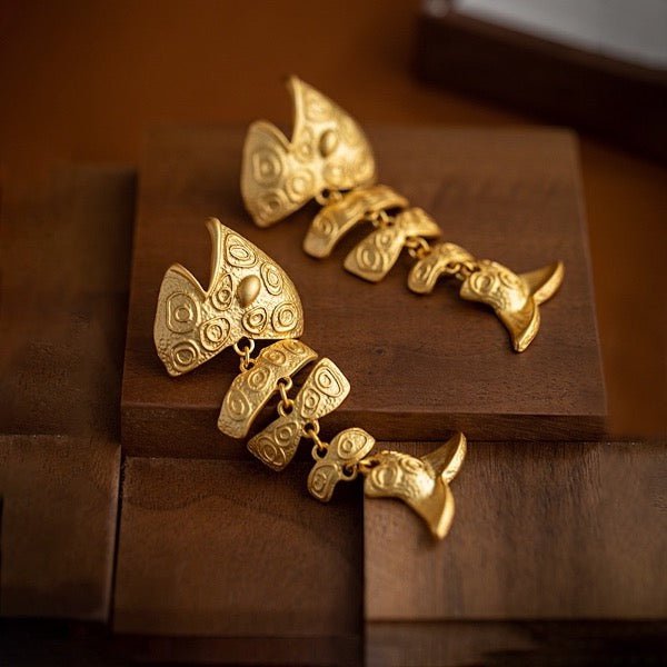 Dikke visgraat statement oorbellen